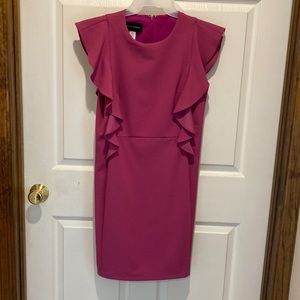 Ruffled sleeveless dress. Dark rose in color